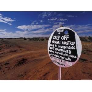  The Mokari Emergency Airstrip and Sign in the Remote Sand 