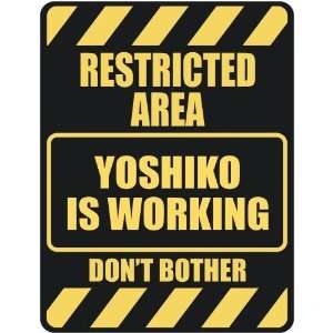   RESTRICTED AREA YOSHIKO IS WORKING  PARKING SIGN