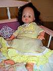 vintage 18 tall composite doll with pink dress, eyes close  