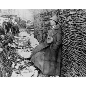   Kirtland in trench during World War I; she is wearing a helmet and gre