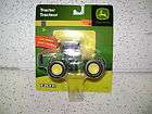 Set of 3   (1/64 scale) Farm Tractors  Mint in packaging.