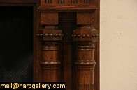 An exceptional solid oak architectural salvage fireplace mantel is an 