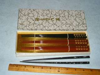   . Used condition, some fading. One chopstick looks a little warped