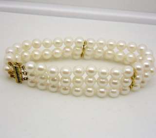 TRIPLES STRAND AKOYA PEARL 14K G EMERALD CLASP BRACELET  