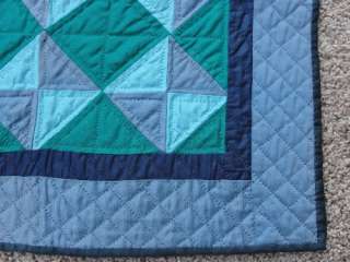This GORGEOUS 100% cotton 40s/50s hourglass Amish doll quilt is hand 