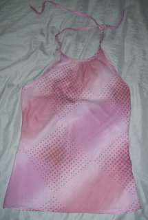   top s pretty halter top with vaguely geometric design ties at the neck
