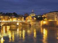 night shot of a bridge in rome