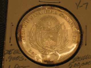 1911 UN PESO FROM THE BRUSSELLS MINT IN UNCIRCULATED CONDITION #910 