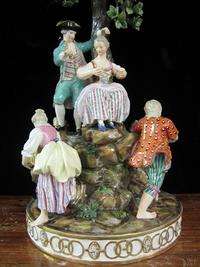 LOVELY MEISSEN PORCELAIN GROUP, SIX FIGURES AROUND TREE  