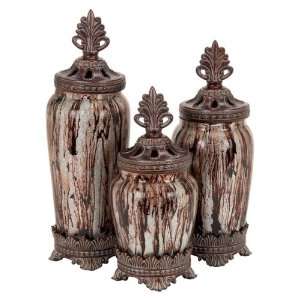   of Three Exotic Glass Polystone Decorative Canisters