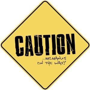   CAUTION  MCMANUS ON THE WAY  CROSSING SIGN