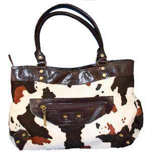 HB 027   Measures approx. 14 wide by 9 tall. This hand bag has an 