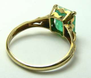   Simply Beautiful Emerald Cut Colombian Emerald & Gold Ring  