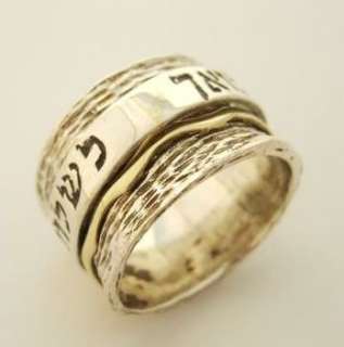 Kabbalah silver and goldring with 2 spinning bands. Fits both women 