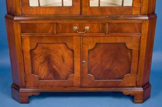   mahogany grain looks especially striking on the lower cabinet doors