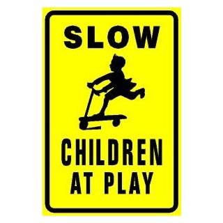 SLOW CHILDREN PLAYING yellow street sign 