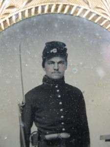 Civil War Soldier with rifle Hand Tinted Ambrotype in Ornate Frame 