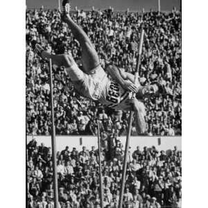  Robert B. Mathias Attempting the Pole Vault at 1952 