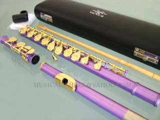 Up for bid is a Venus purple flute with gold plated keys and lip plate 