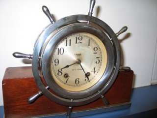 THIS IS A VINTAGE SETH THOMAS SHIPS CHIME MANTEL CLOCK IS A VERY NICE 